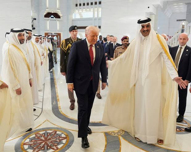 Reactions as Qatar Emir was spotted introducing Aliko Dangote to Donald Trump in Qatar Reactions as Qatar Emir was spotted introducing Aliko Dangote to Donald Trump in Qatar